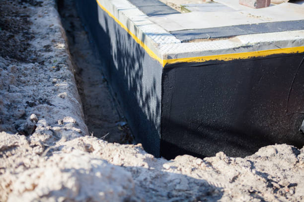 Professional Basement Waterproofing technician working in Fort George G Meade, MD